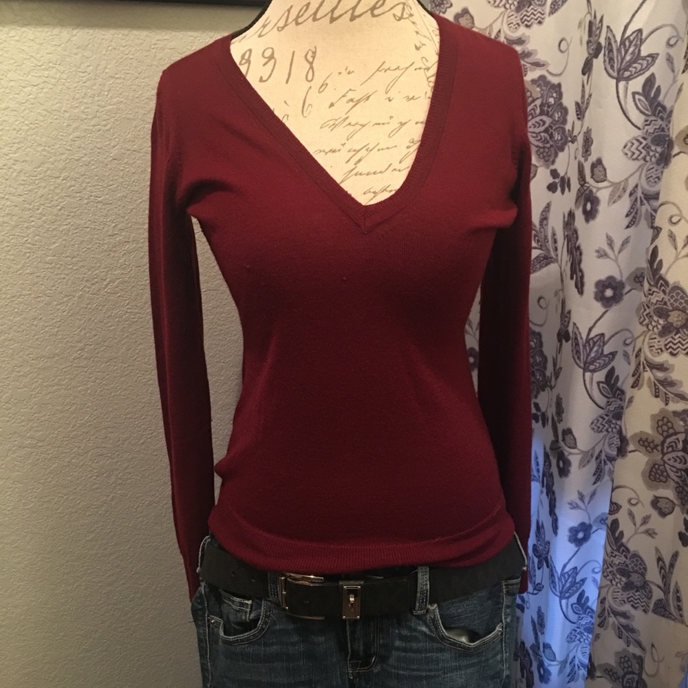 Classic v neck sweater. Deep merlot color